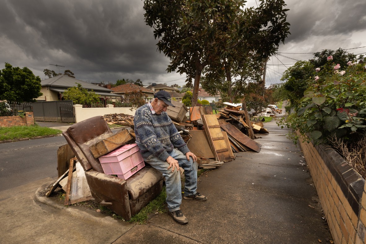 A photo of a sitting amongst the flooded debris