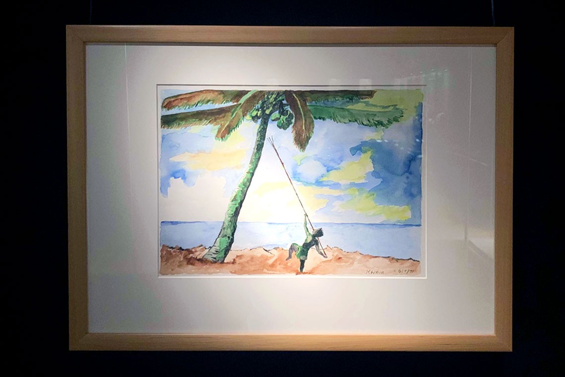 Artwork of a man with three-pronged stick retrieving coconuts by the ocean