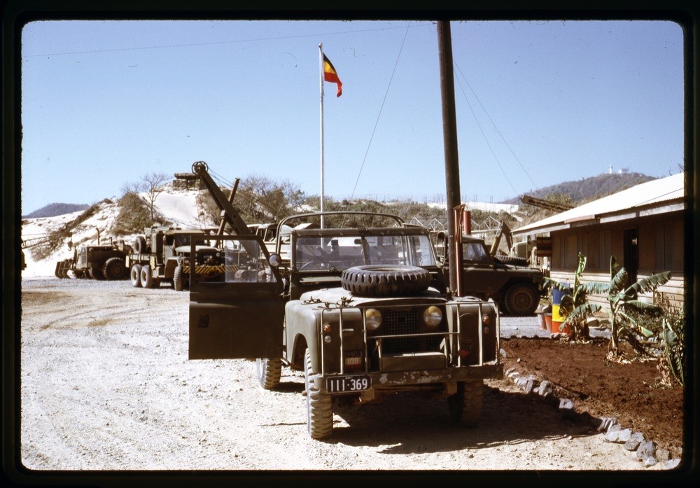 Military cars and vehicles parked somewhere in Vietnam, 1968-69.