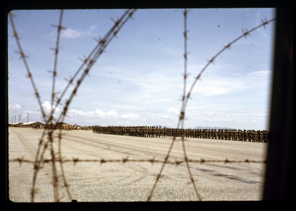 Photo of Australian troops in Vietnam taken trough the barbwire
