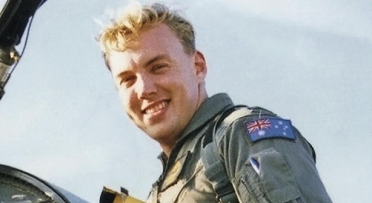 Head and shoulders of man wearing Australian defence flight suit