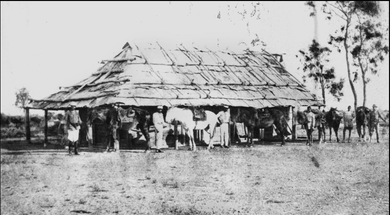 Building with horses and men out front at Lammermoor Station (1874)