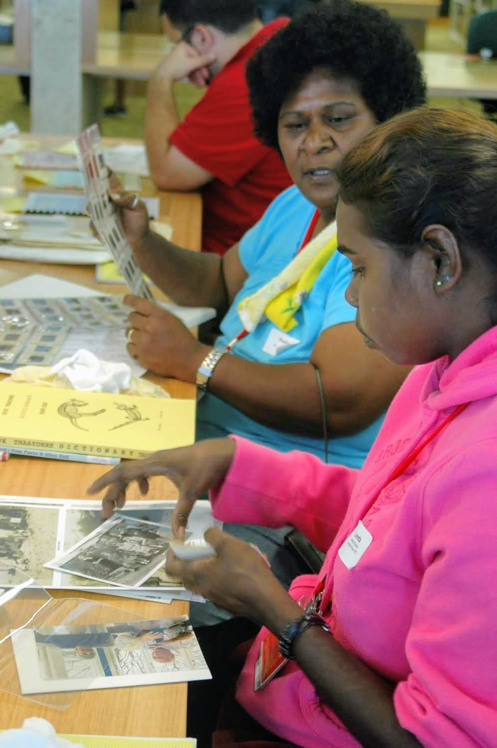 Pauline Lifu at State Library reviewing photographs in the John Oxley Library in 2008