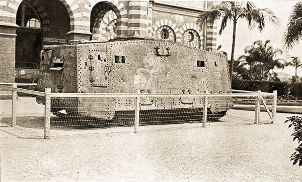 Mephisto outside the Queensland Museum, Bowen Hills surrounded by short fence