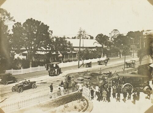 German tank "Mephisto" arriving at the Queensland Museum, Bowen Hills pulled by a steam roller and greeted by crowd