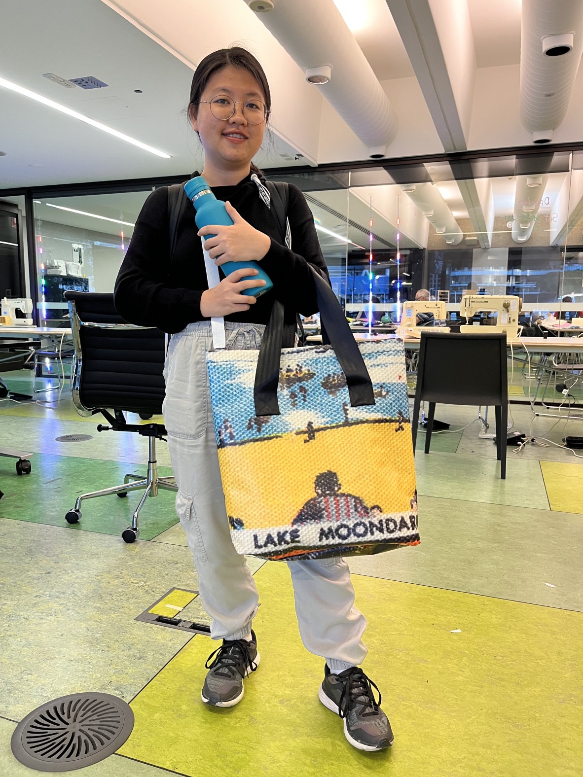 A photo of someone with a vinyl bag