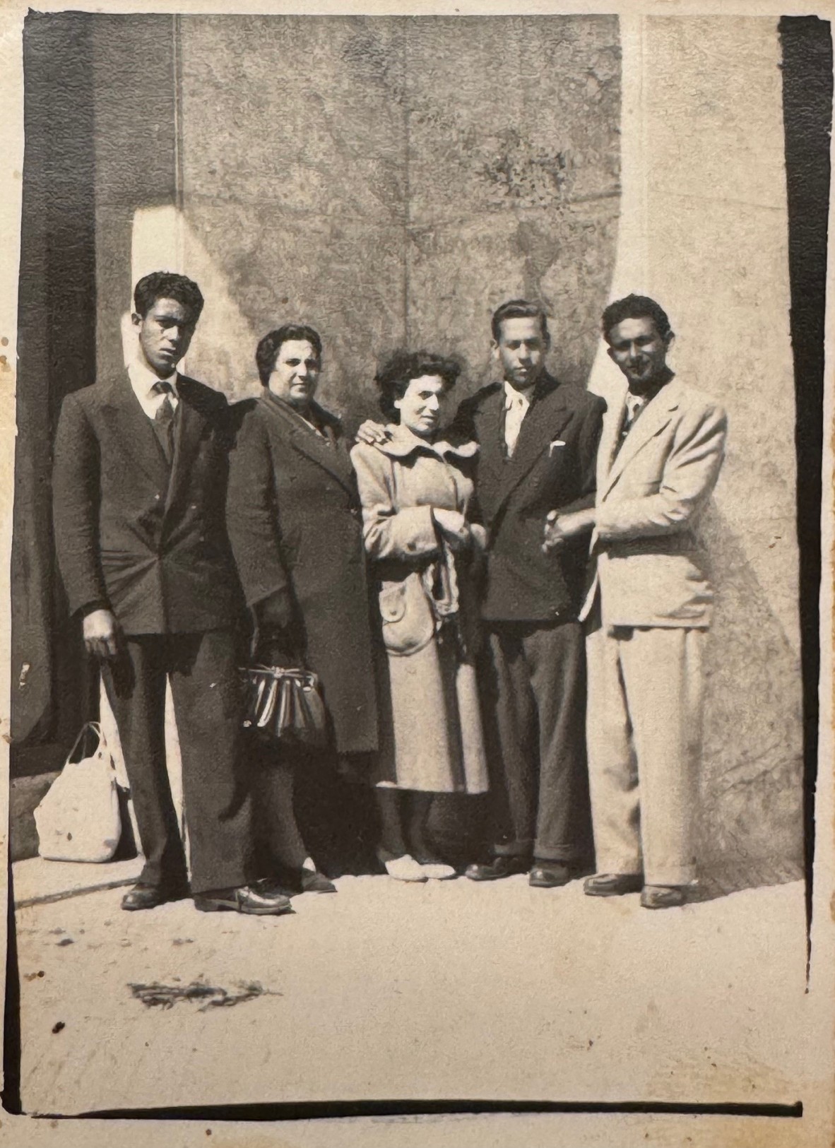 Group of five people - Leonardo Scalia's family farewelling him as he leaves for Australia.
