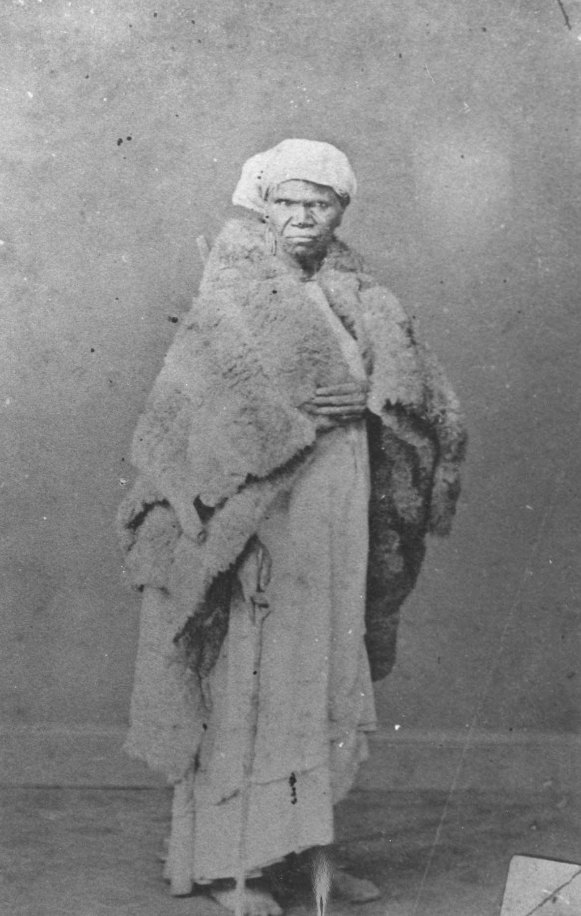 Aboriginal woman wearing fur c1870
