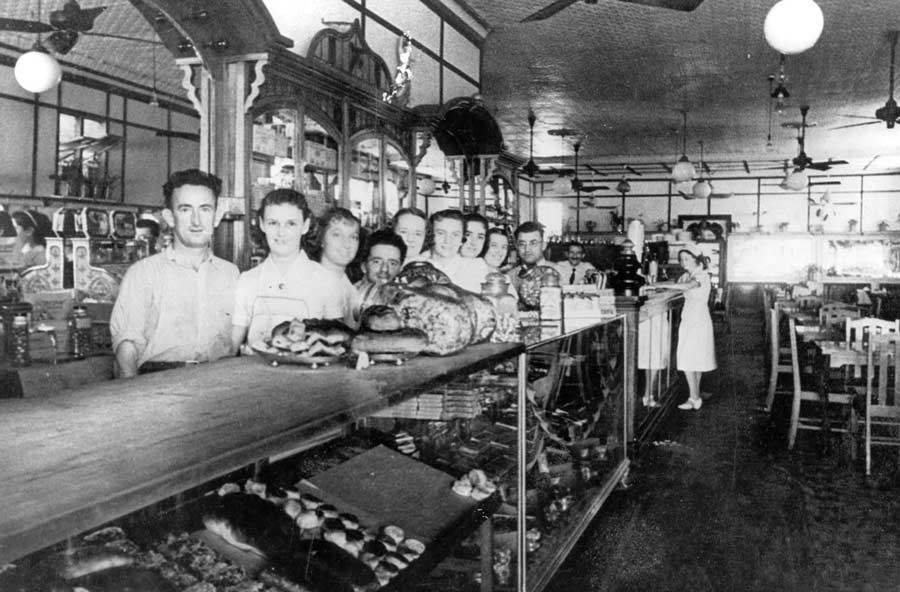 Staff at the counter of the Blue Bird Caf