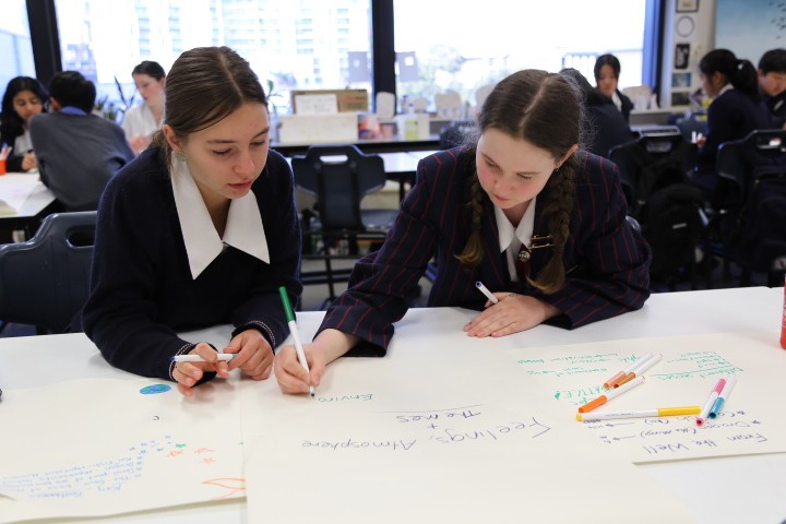 Two students drawing ideas for The Great and Grand Rumpus exhibition