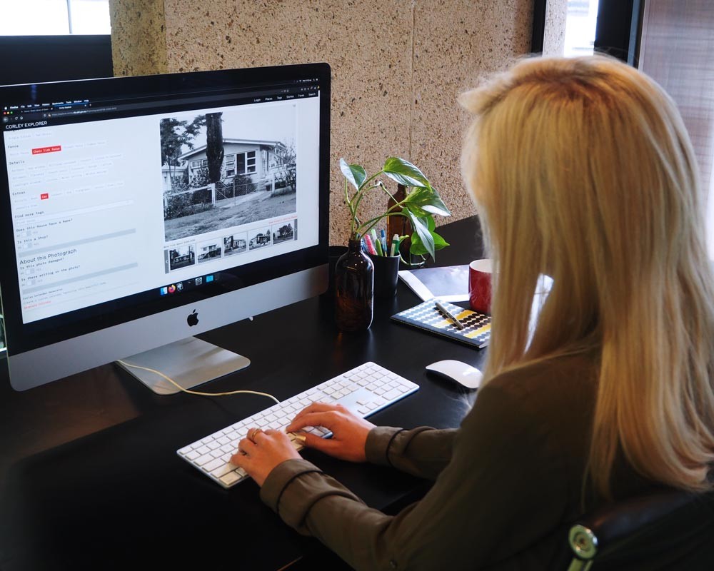 Woman using the Corley Explorer on computer