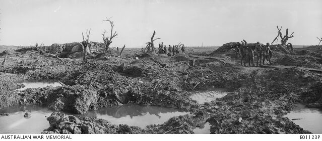 Passchendaele: Stretcher bearers and troops move across a muddy Anzac Ridge.