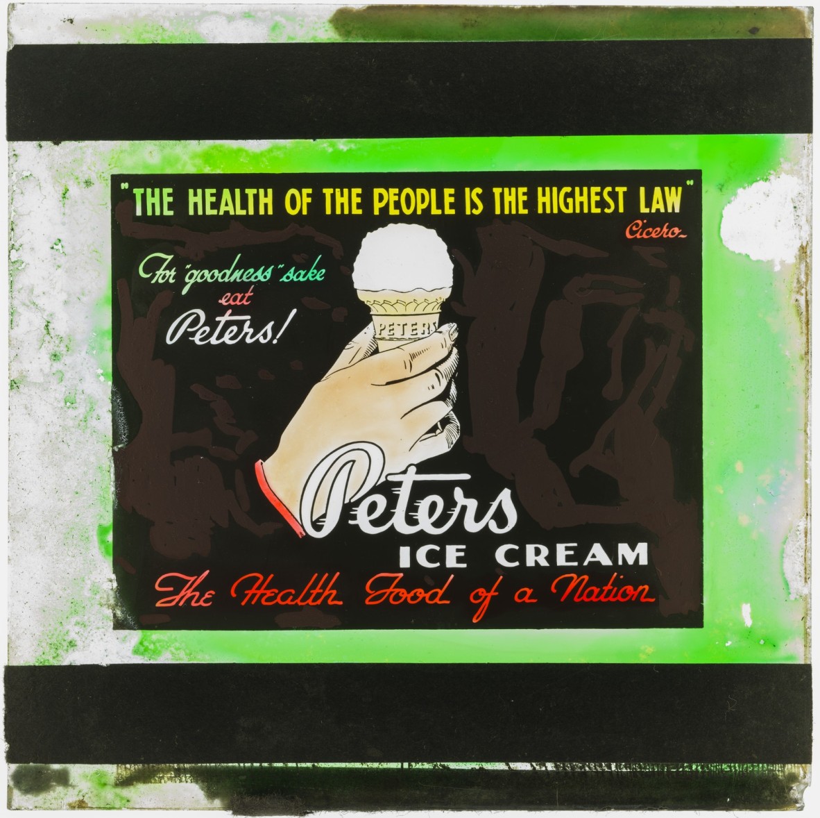A hand holding an ice cream in an advertisement for Peters Ice Cream