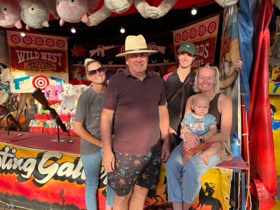 Amarni with her grandfather, Charlie Pink and family on sideshow alley.
