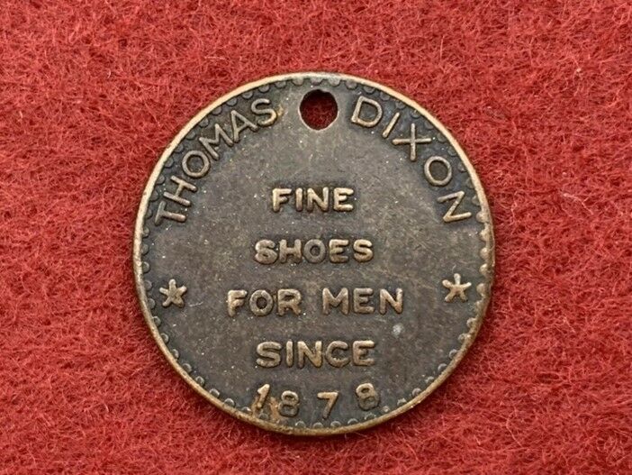 T C Dixon Advertising token.  