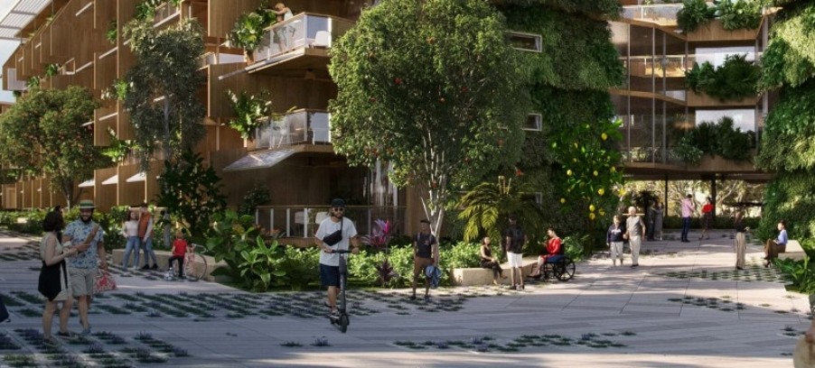 Image of urban area with apartment buildings, greenery and people
