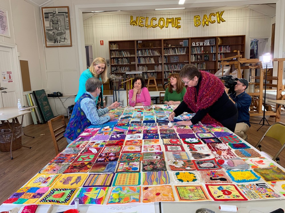 Queensland Quarantine Quilt being assembled by members of Queensland Spinners Weavers and Fibre Artists