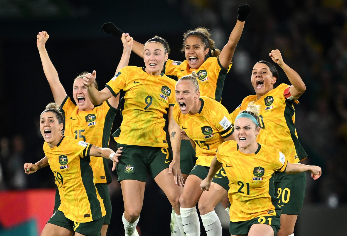A photo of Australian Matildas football players celebrating 