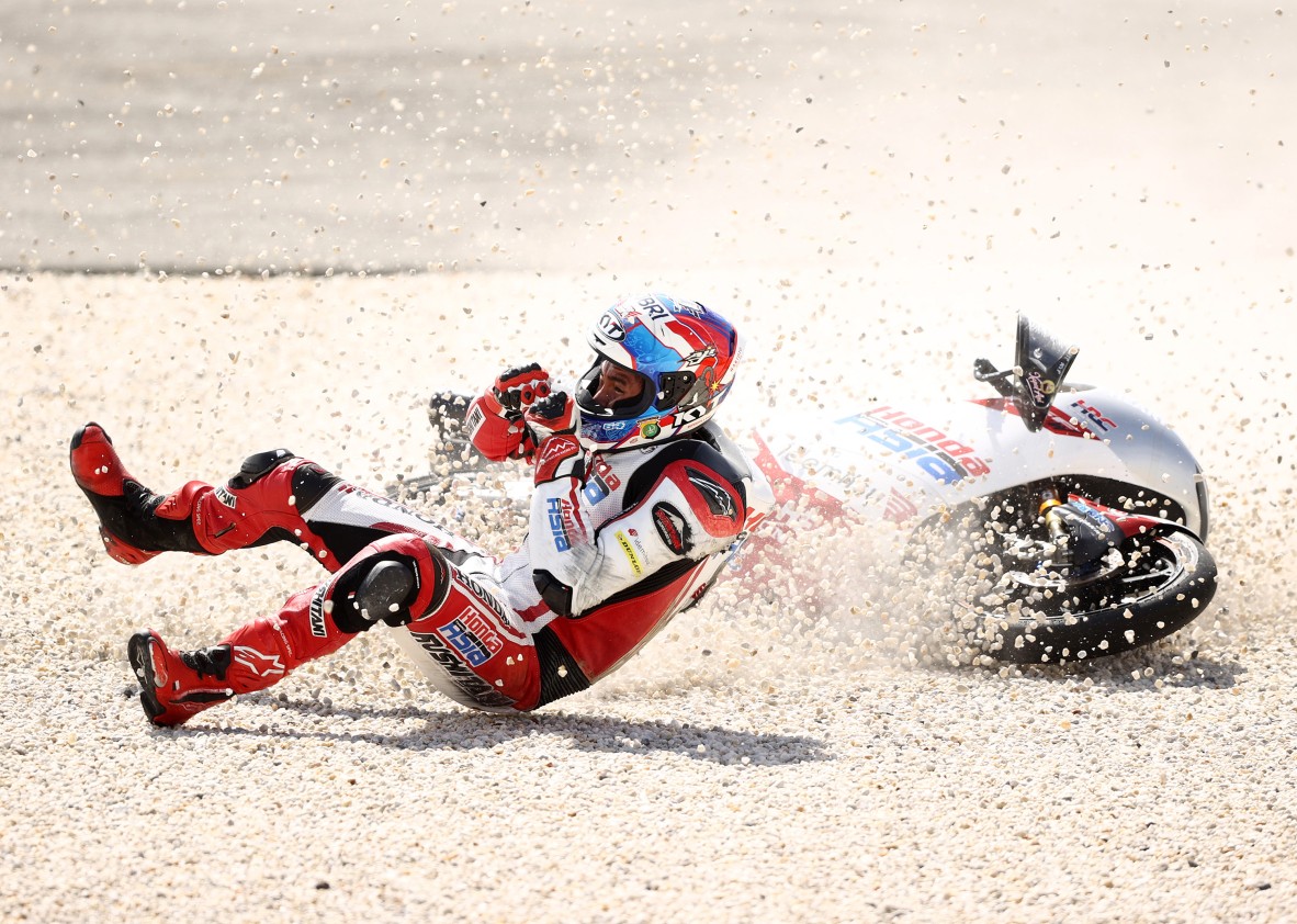 A motorcycle racer crashing