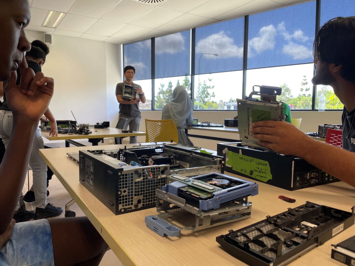 Trainer showing computer parts
