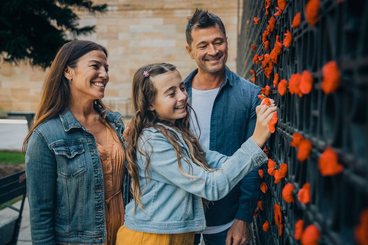 Family at the Anzac Square Wall, 20 September 2022, PixelFrame, Corporate Image Library