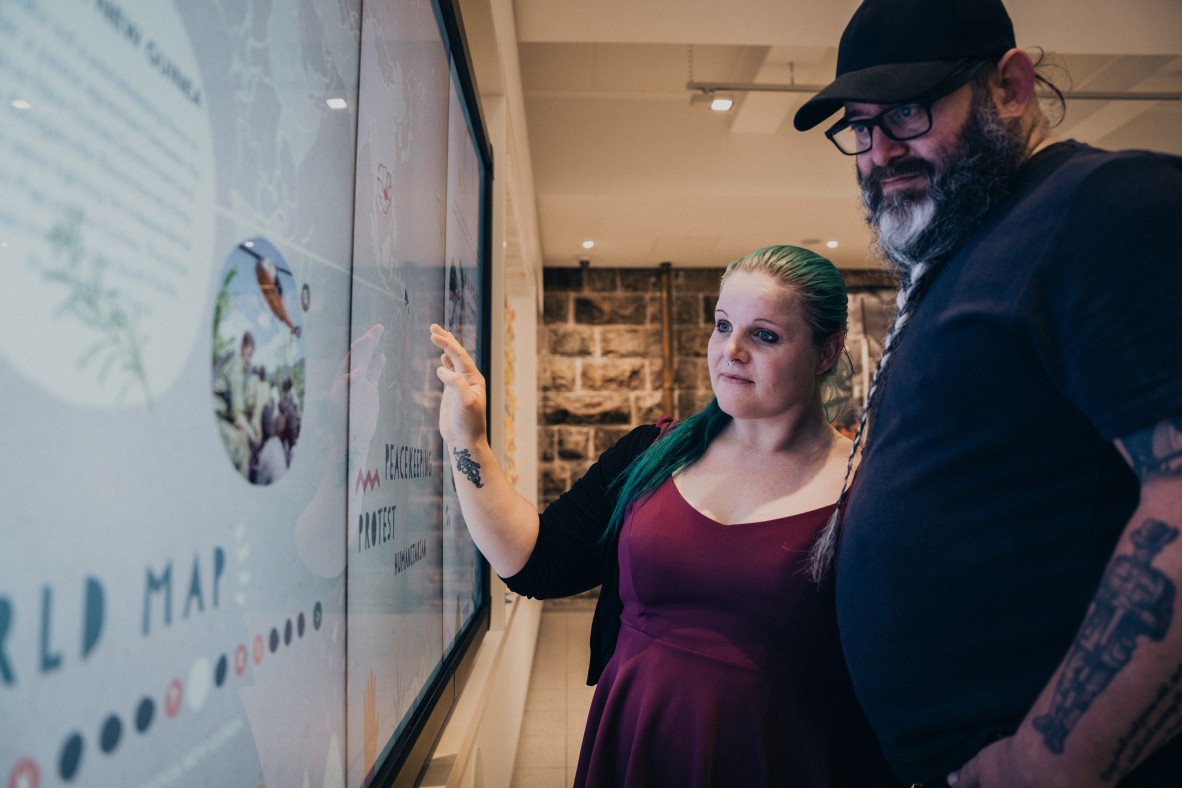 Visitors in the Post World War II Gallery at Anzac Square