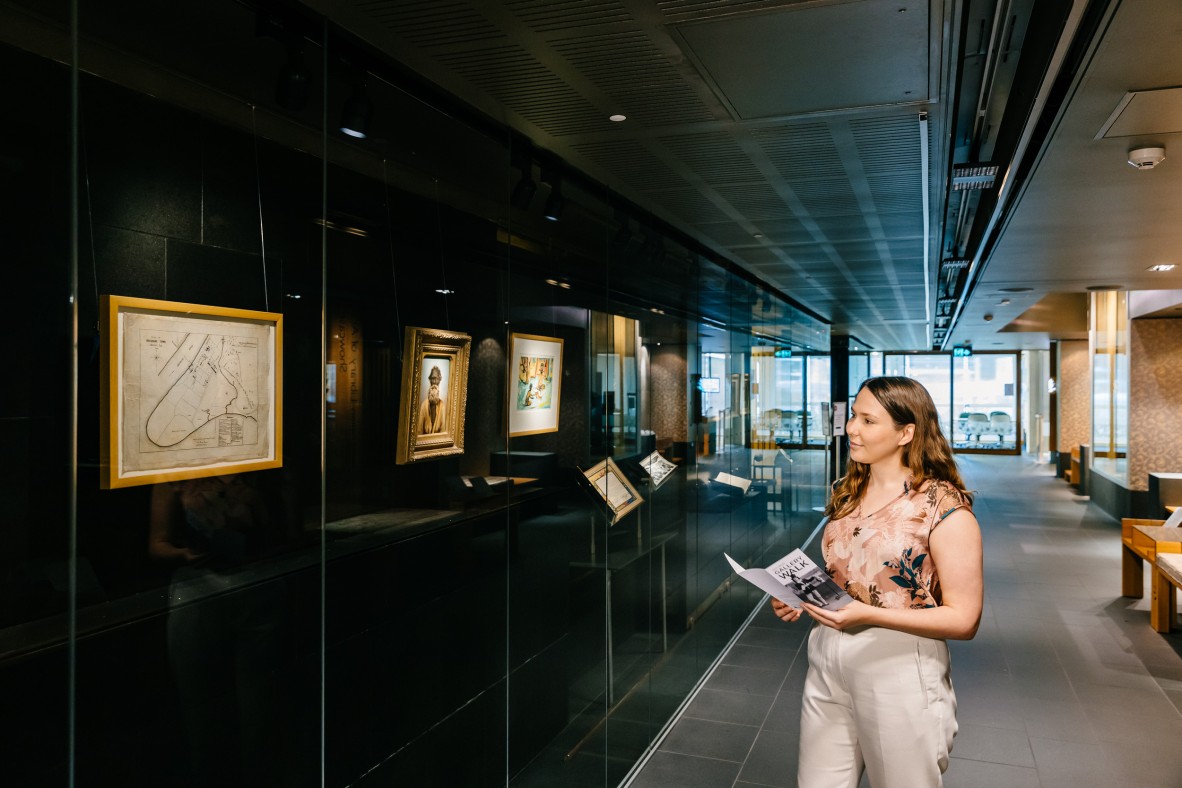 Visitor viewing the Talbot Family Treasures Wall