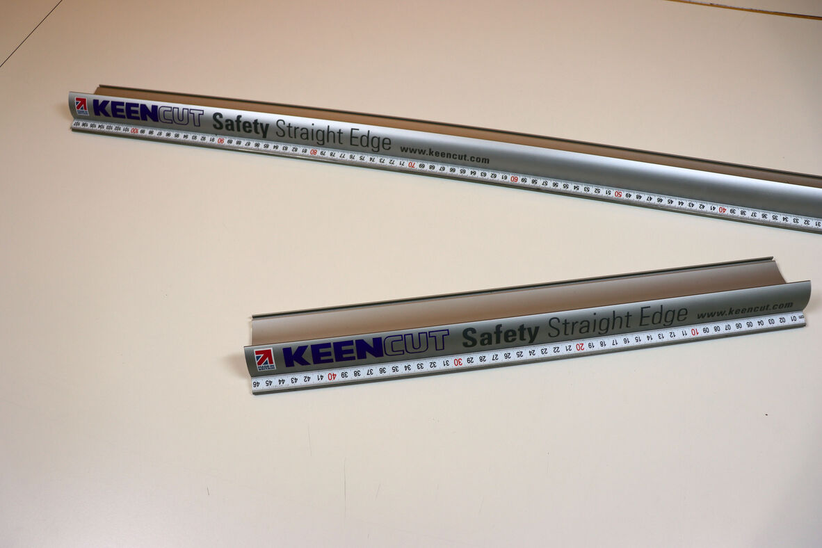 photo of two saftey rulers. 