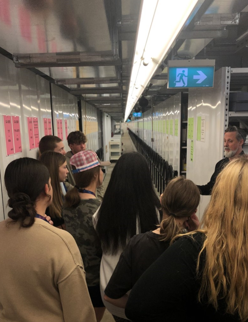 Participants taking part in a repository tour with Access Assistant Tam Patton.