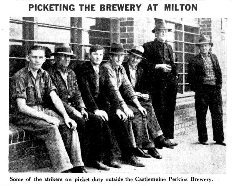 Black and white newspaper photograph of seven men sitting on a wall and standing. Headline reads: 'PICKETING THE BREWERY AT MILTON'. Caption reads: 'Some of the strikers on picket duty outside the Castlemaine Brewery.'