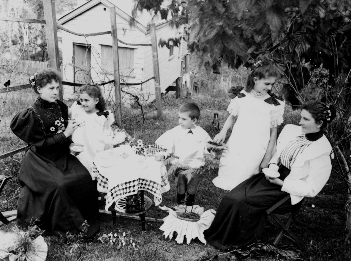 Taking tea in the garden 1890s Photographer Unidentified John Oxley Library State Library of Queensland Negative number 43999