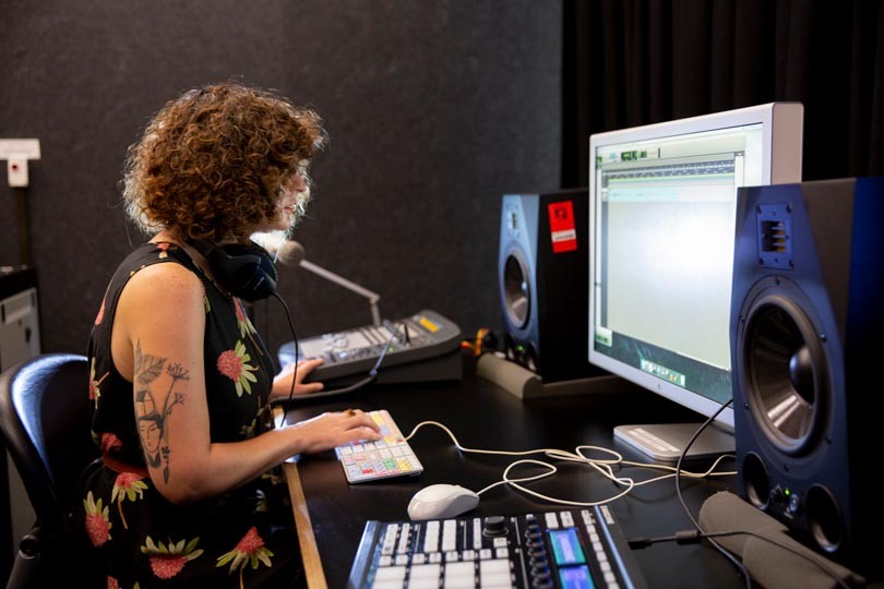 Woman mixing sound in the Edge recording studio