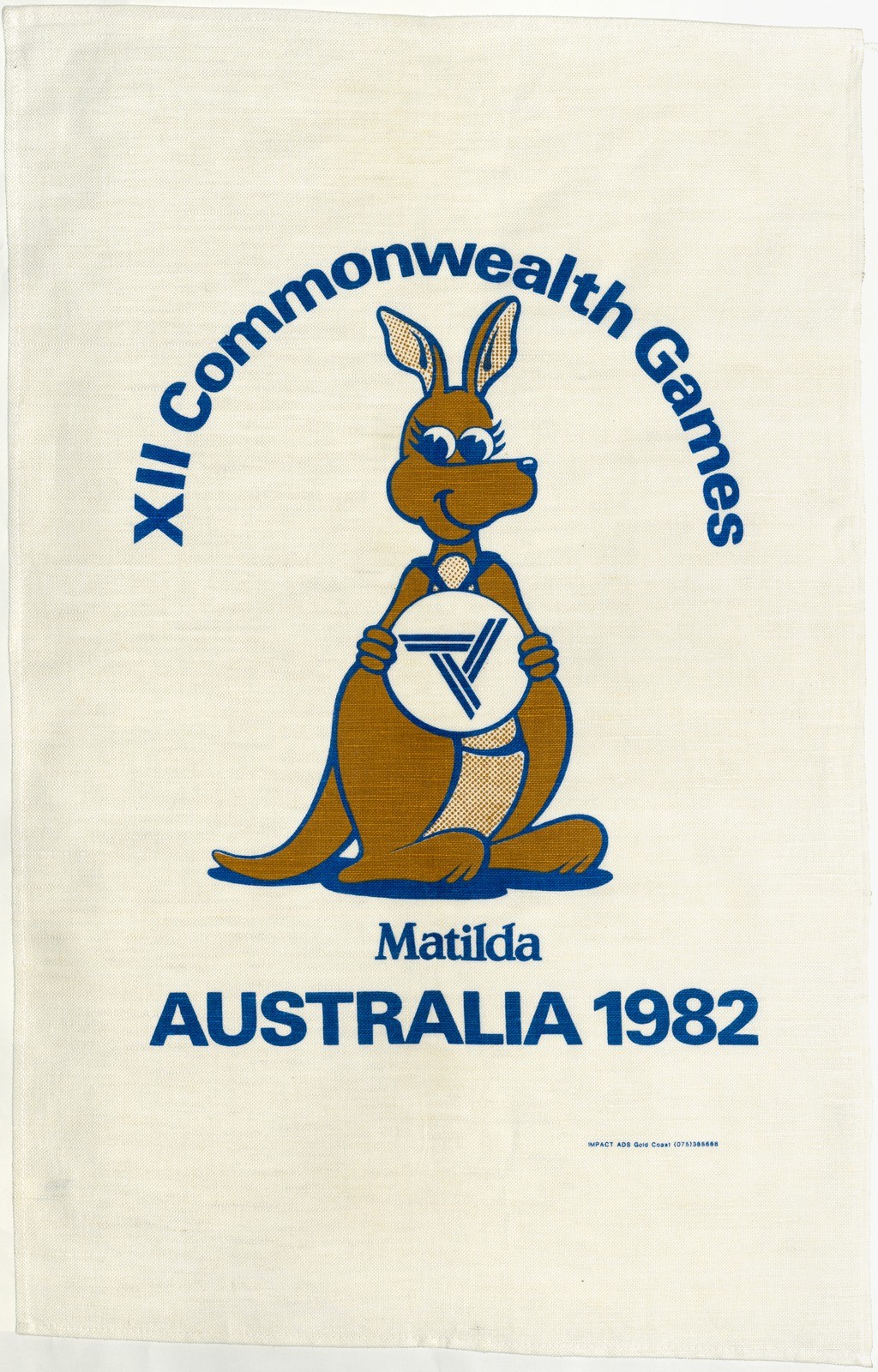 XII Commonwealth Games tea towel, c.1982. Made by Impact Ads.