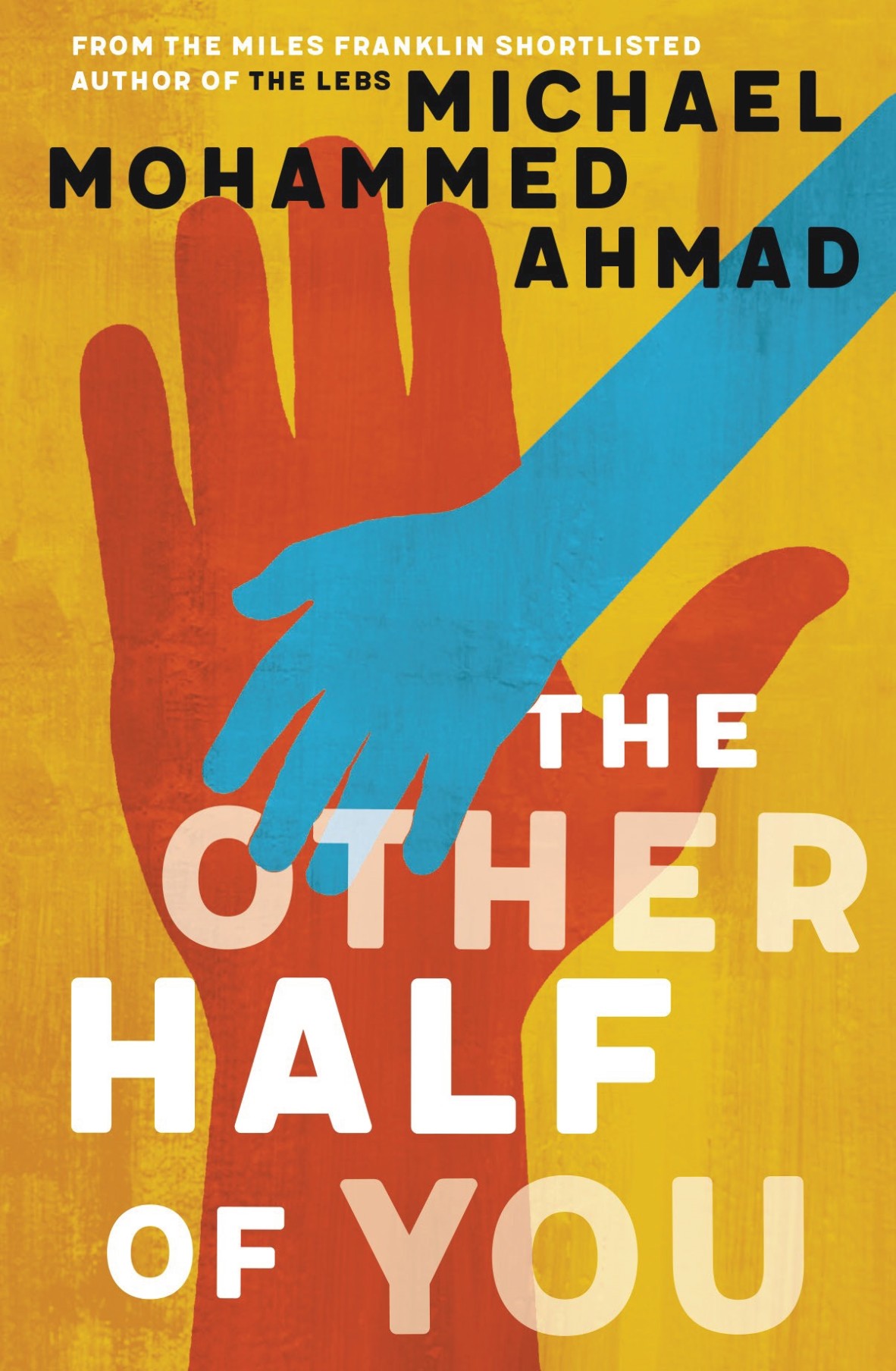Cover of The Other Half of You by Michael Mohammed Ahmad Its a yellow illustrated cover with a large orange hand and a small blue hand placed over it