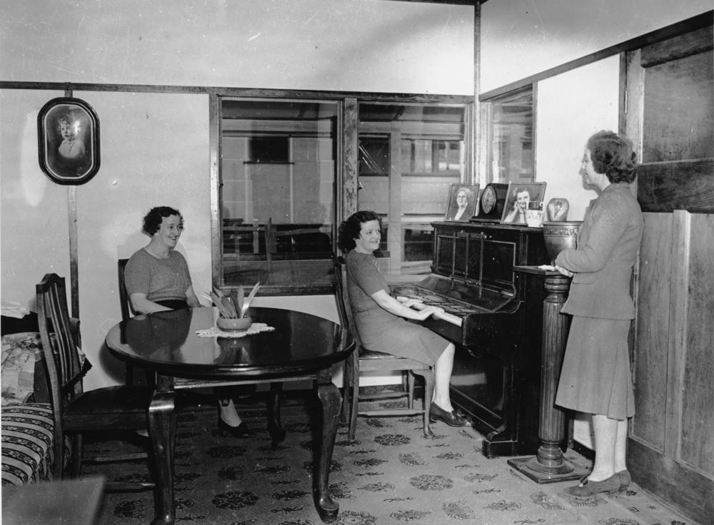 Three women in a Rocklea war workers' house, Brisbane, 1944.