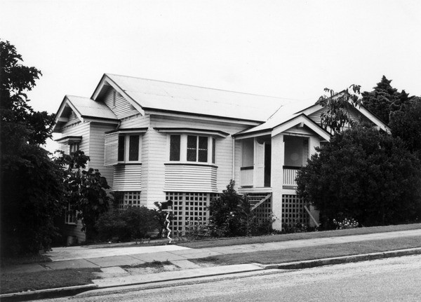 A black and white photograph of a house with gables in Annerley