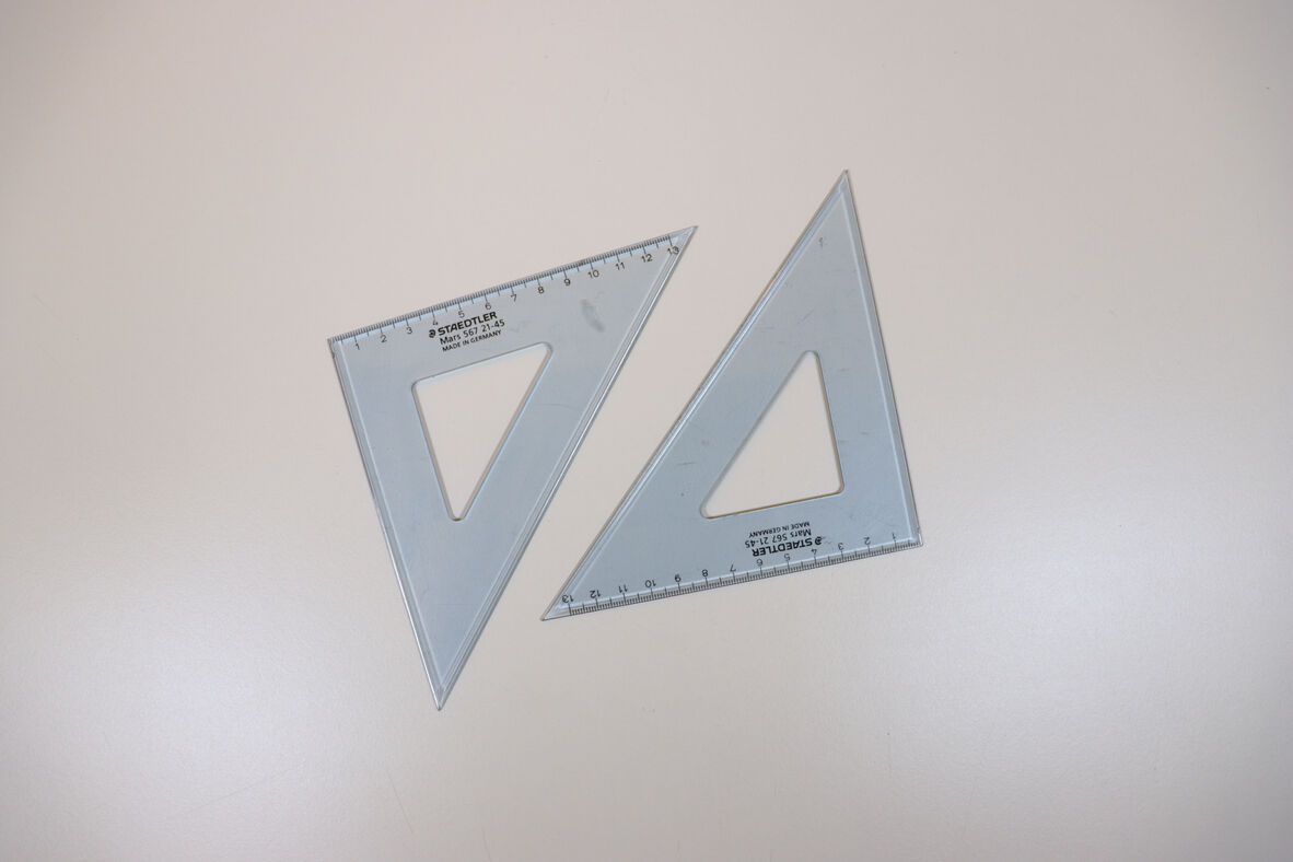 A photo of two 45deg Set Squares.