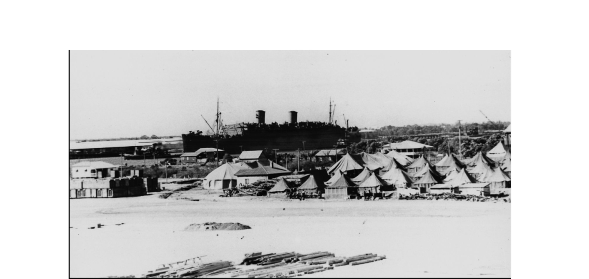 A camp set up with lots of tents