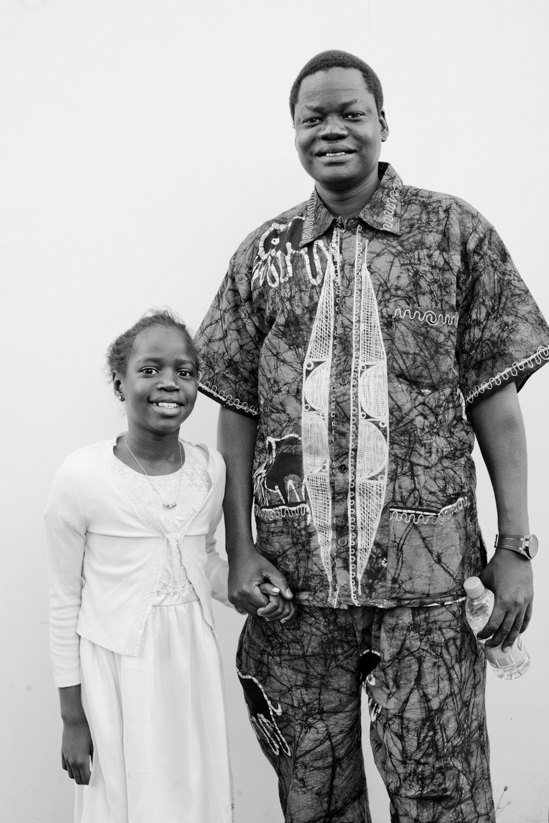  Portrait of a man and young girl from the Brisbane South Sudanese community celebrating South Sudan Independence Day (0001-0007), July 2011