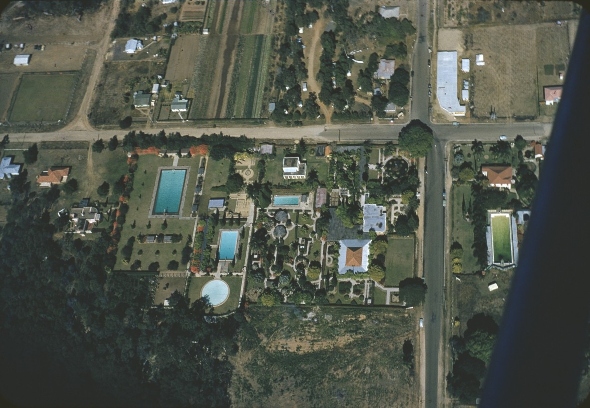 Aerial view of houses with backyard swimming pools Brisbane 1955-1965