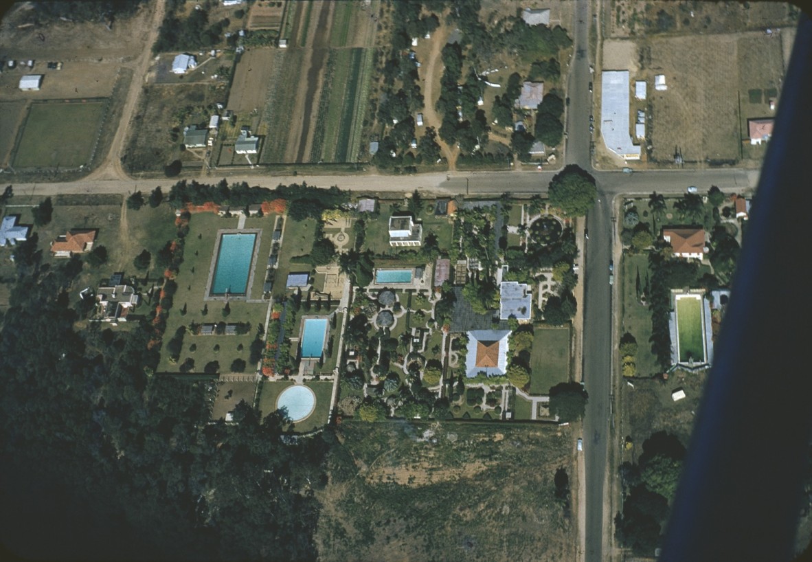 Aerial view of houses with backyard swimming pools, Brisbane 1955-1965