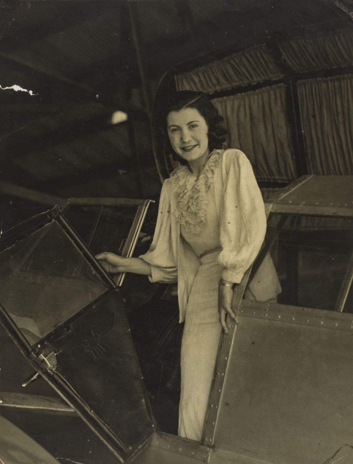 Ivy May Pearce in the cockpit of her aircraft Archerfield 1935