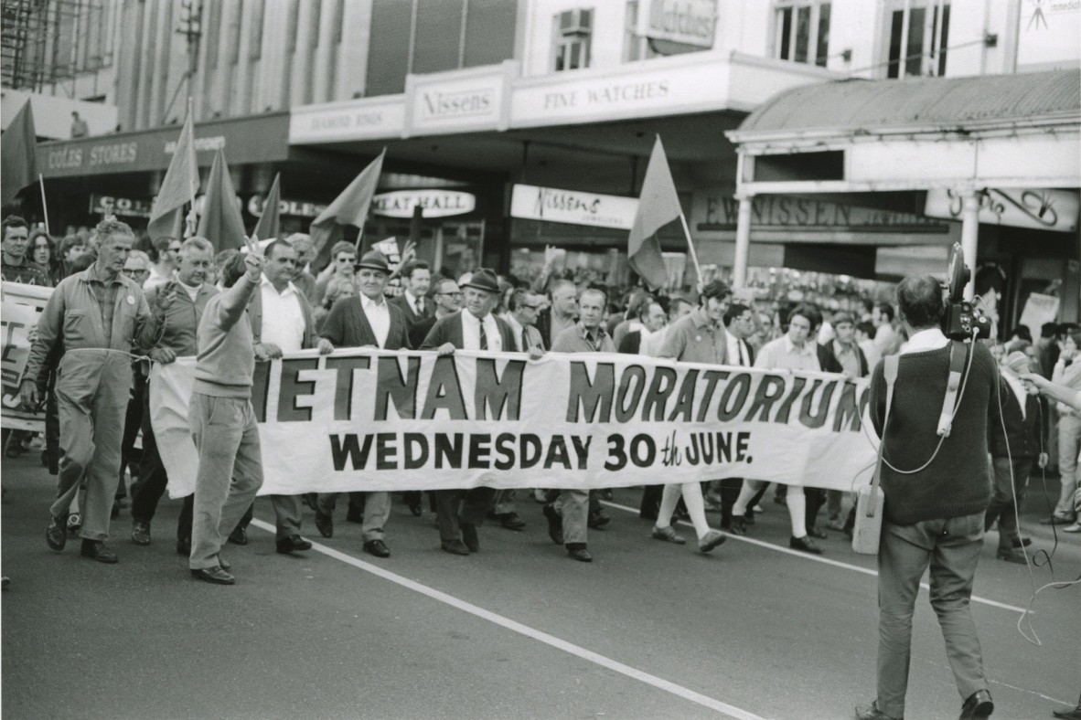 a group of people protesting the vietnam war 