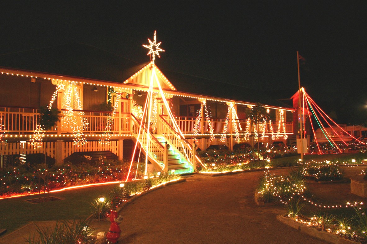Large queenslander home lit up with christmas lights