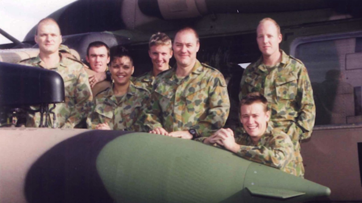 Lorraine Hatton and others beside a helicopter in Irian Jaya
