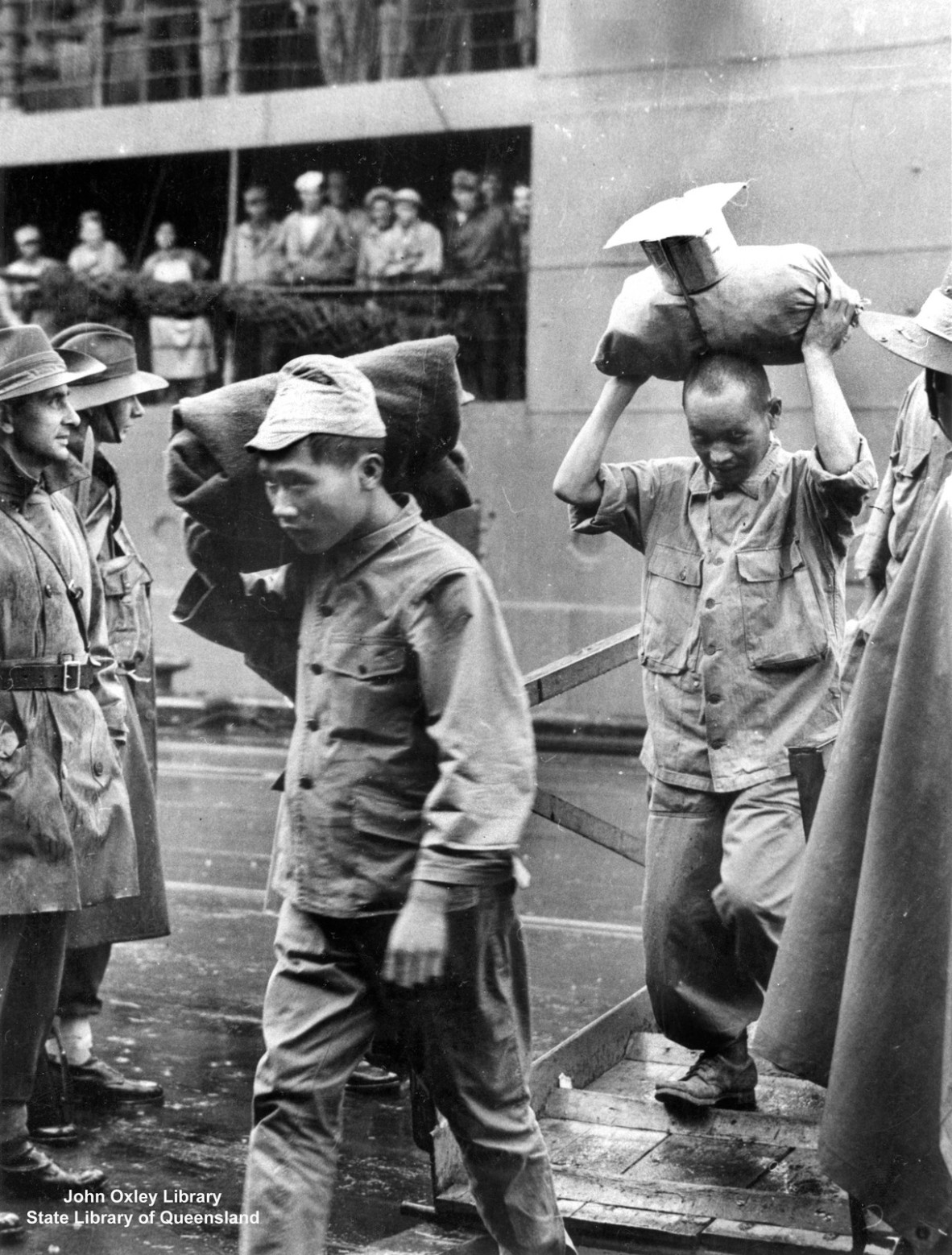 Japanese prisoners of war arriving at Brisbane, ca. 1944