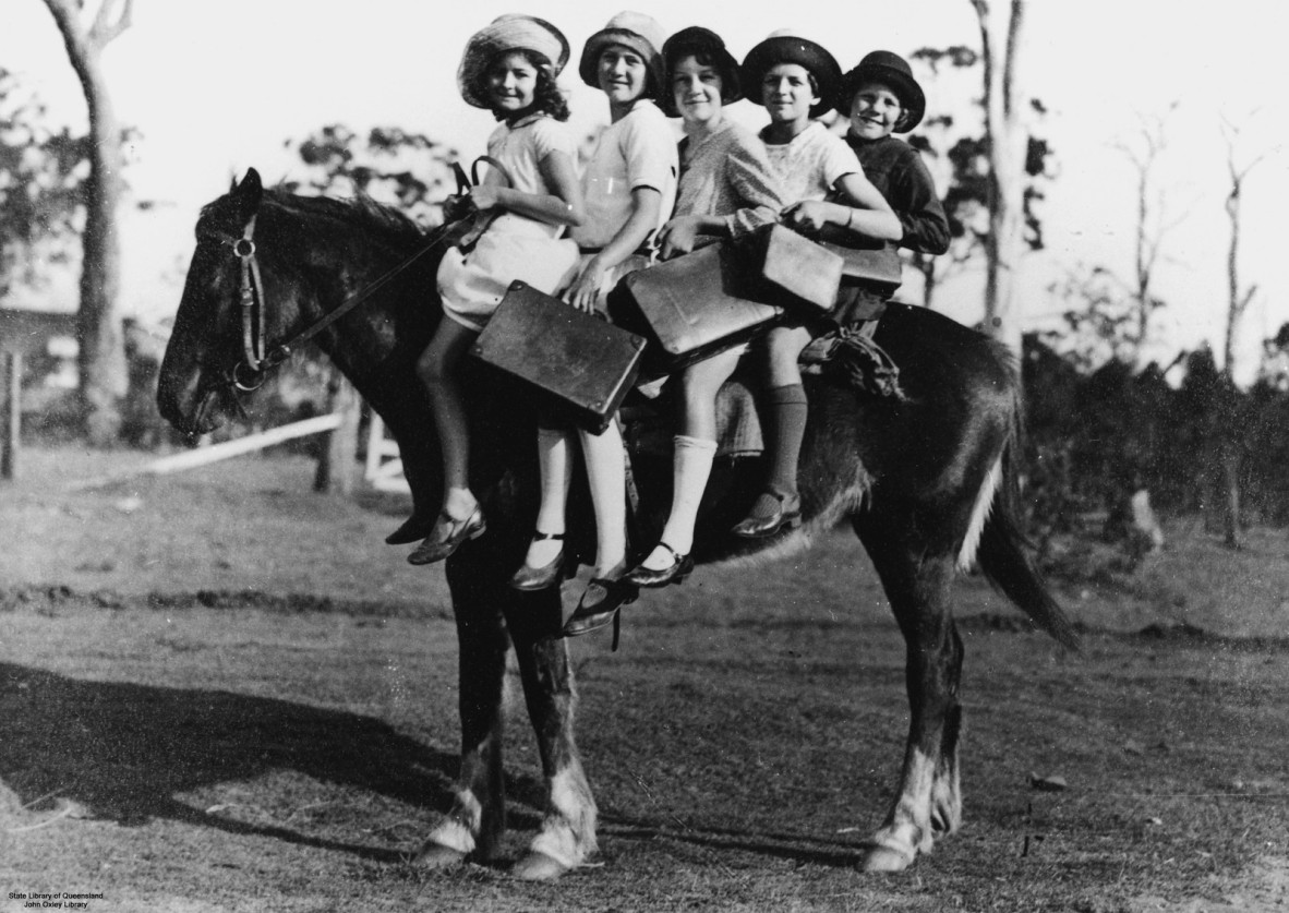 Children riding a horse to school, Glass House Mountains, Queensland, 1928