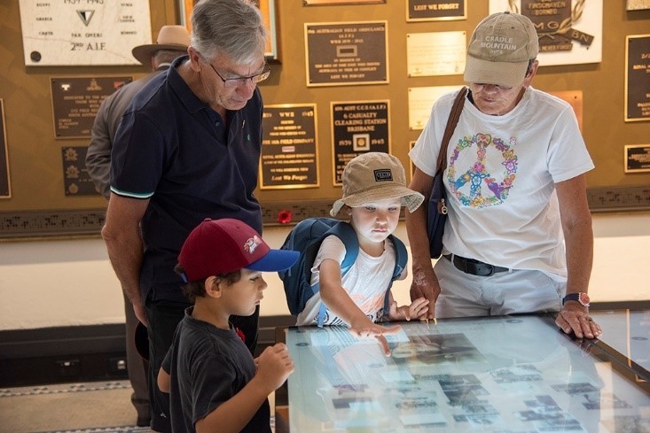 Visitors exploring the collection at Anzac Square Remembrance Day 2019