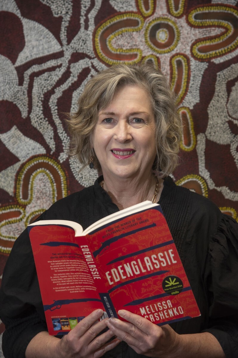 Vicki McDonald holds a book called Edenglassie