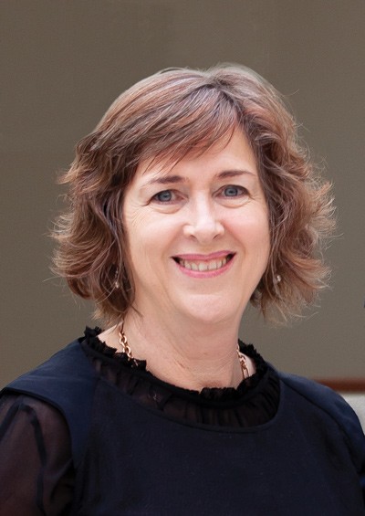 A portrait of Vicki McDonald State Librarian and Chief Executive Officer of the State Library of Queensland